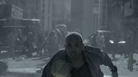 a man running through a city street in the rain