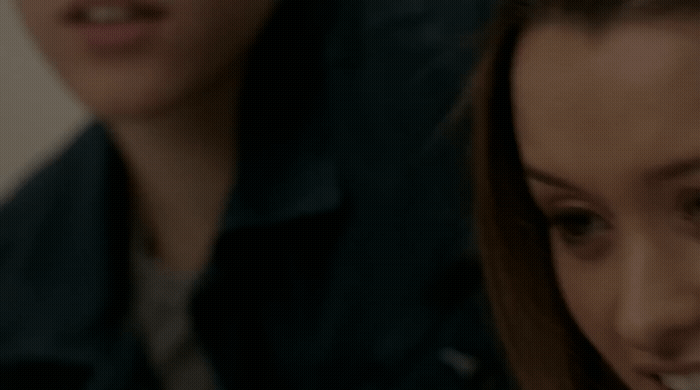 a close up of a person brushing their teeth