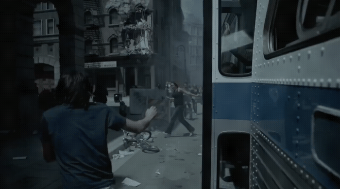 a man walking down a street next to a bus