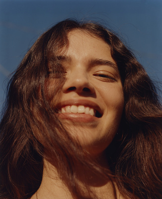 a close up of a person with long hair