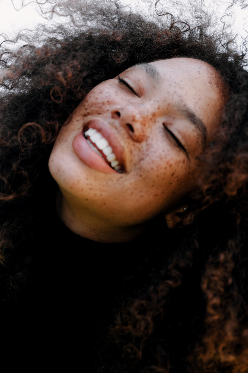 a close up of a person with a cell phone