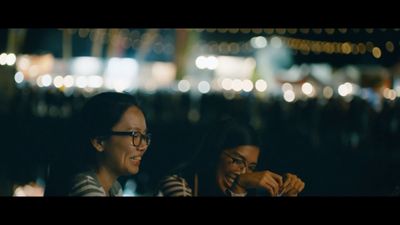 a couple of women sitting next to each other