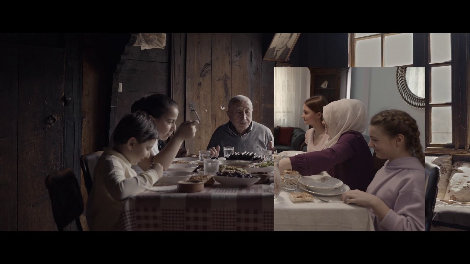 a group of people sitting around a table eating food