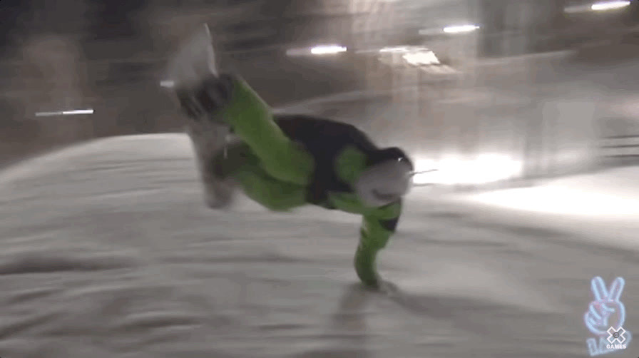 a person on a snowboard doing a trick