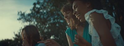 a group of women standing next to each other