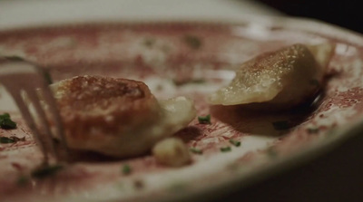 a close up of a plate of food with a fork