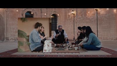 a group of people sitting around a table