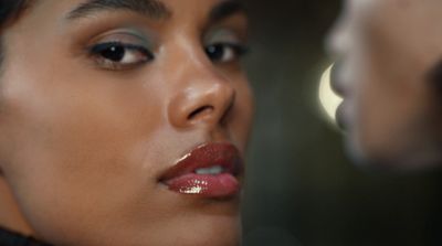 a close up of a person with makeup on