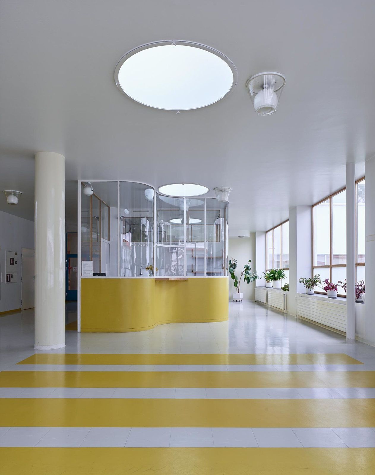 a yellow and white striped floor in an office