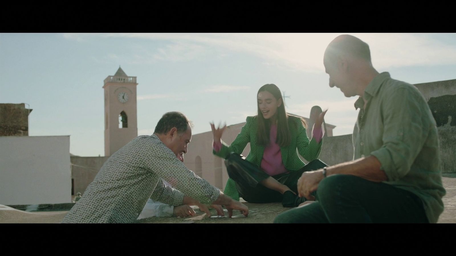 a group of people playing a game of checkers