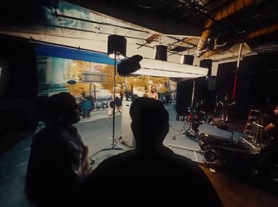 a group of people in a dark room