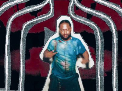 a man standing in front of a red and black background