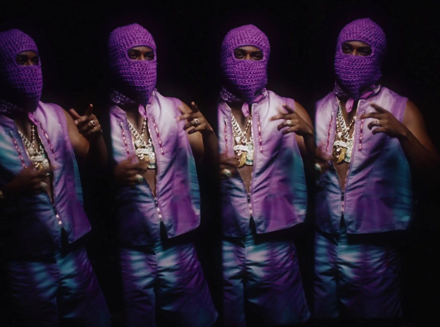 a group of women wearing purple clothing and covering their faces