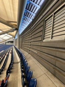 a row of empty seats in a stadium
