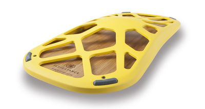 a close up of a yellow object on a white background