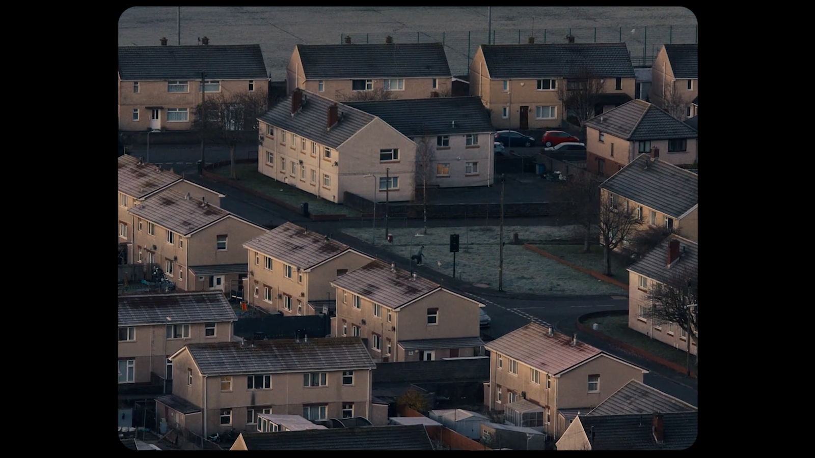 an aerial view of houses in a neighborhood