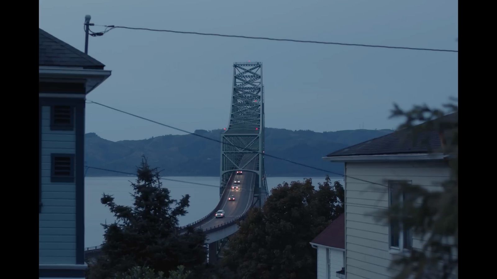 a view of a bridge over a body of water