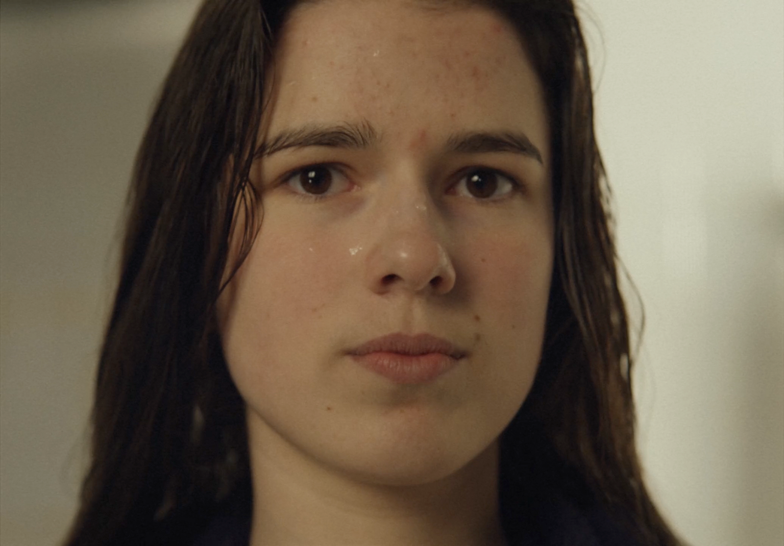 a close up of a person with long hair