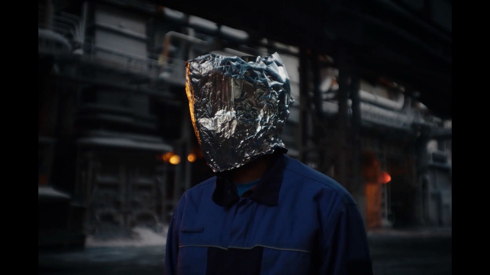 a man wearing a foil covering his face