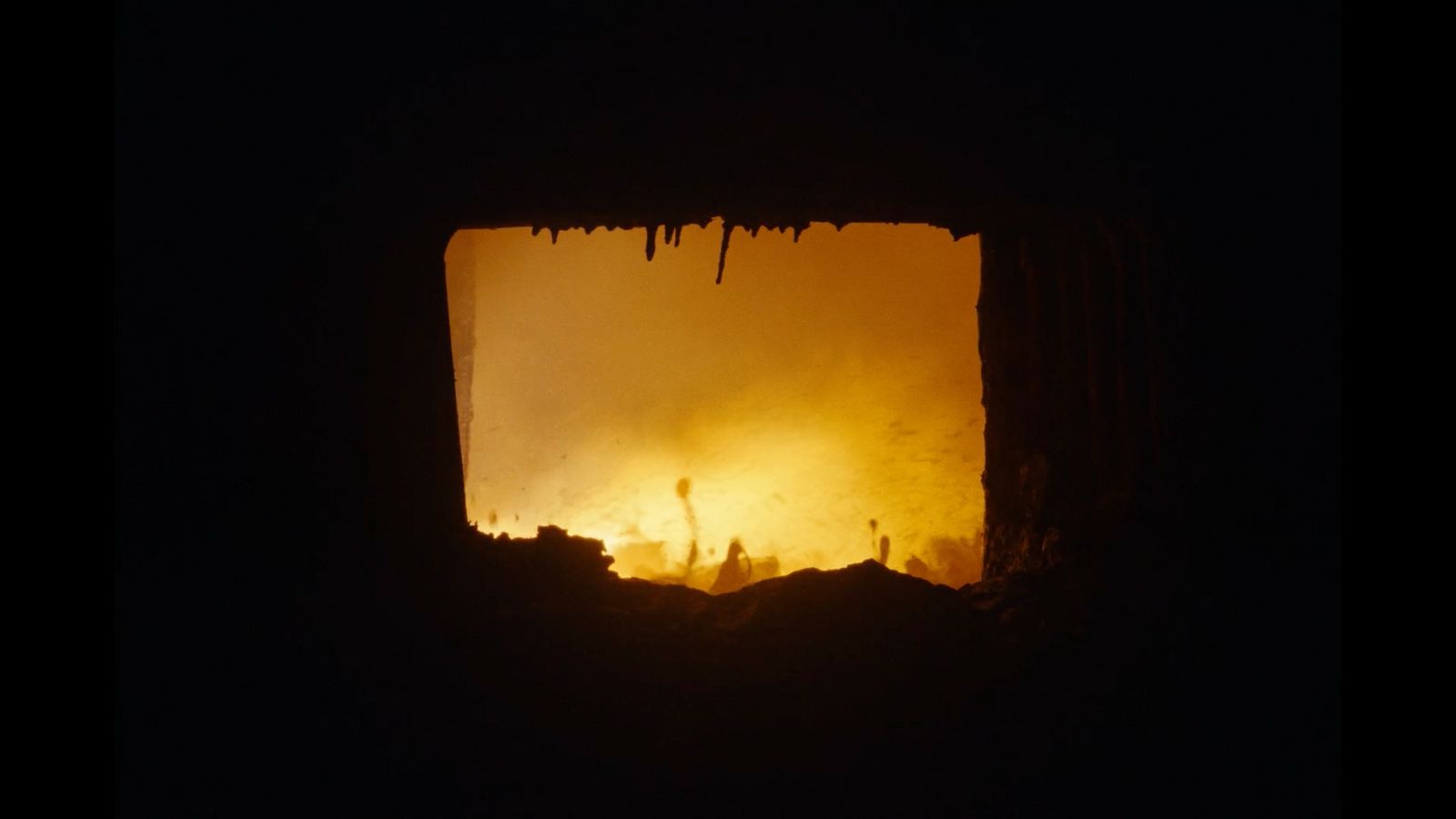 a view of the sky through a window in a building