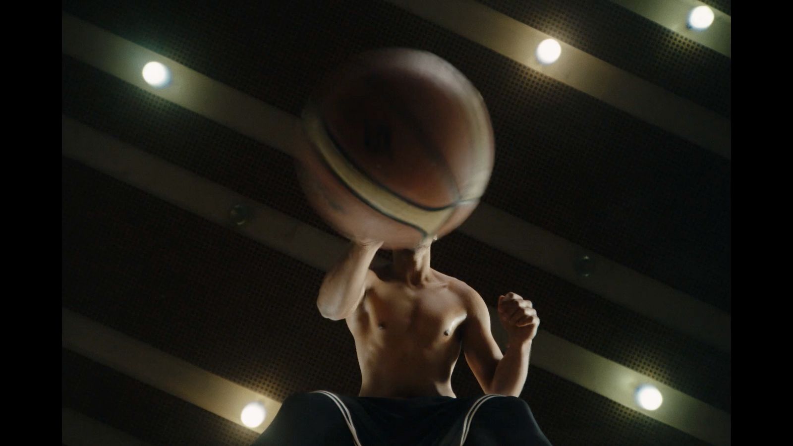 a man with a basketball in his hand