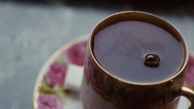 a close up of a cup on a saucer