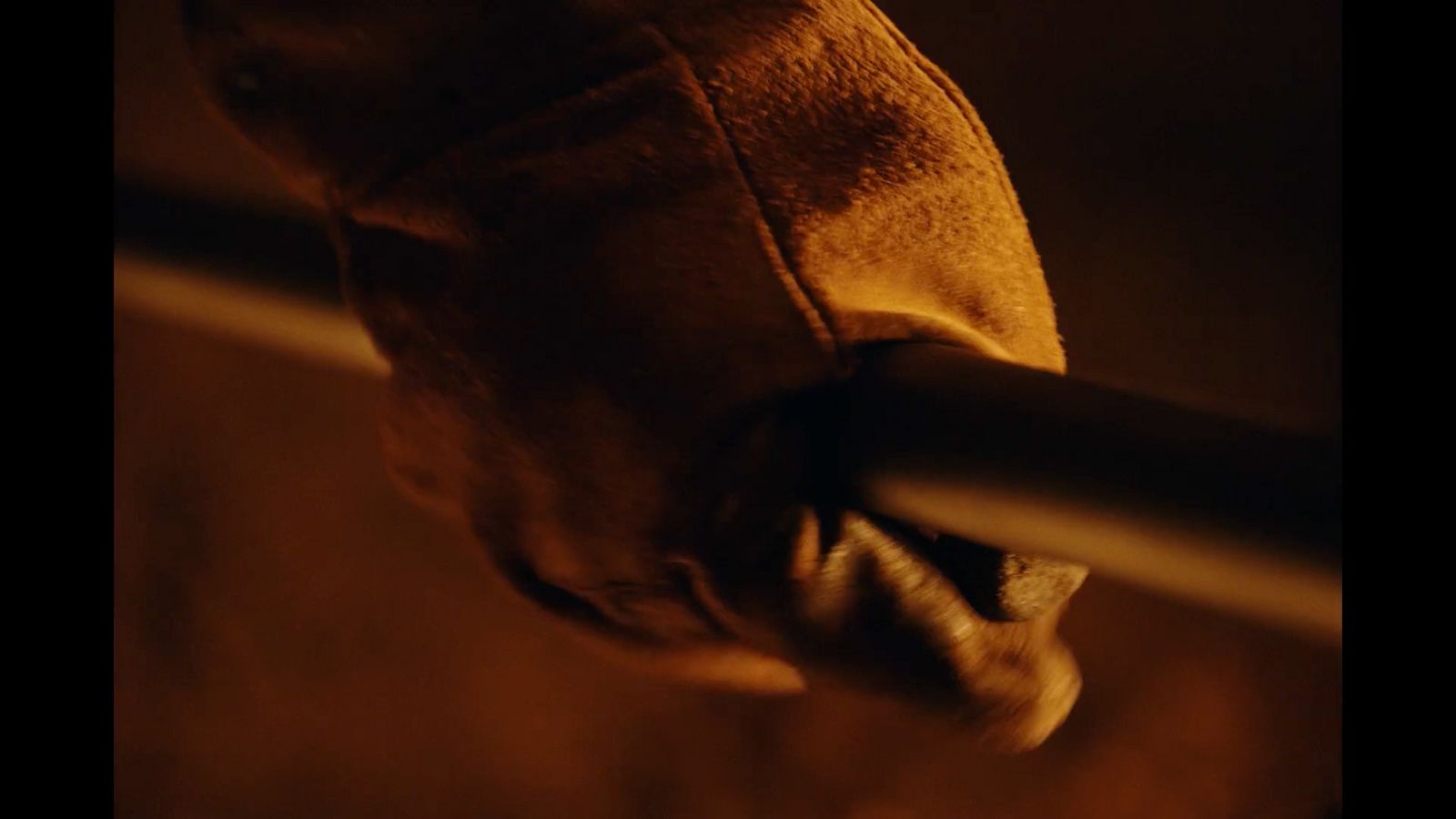 a close up of a person's hand on a rail