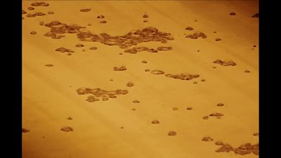 a close up of a table with dirt on it