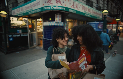 a couple of women standing next to each other