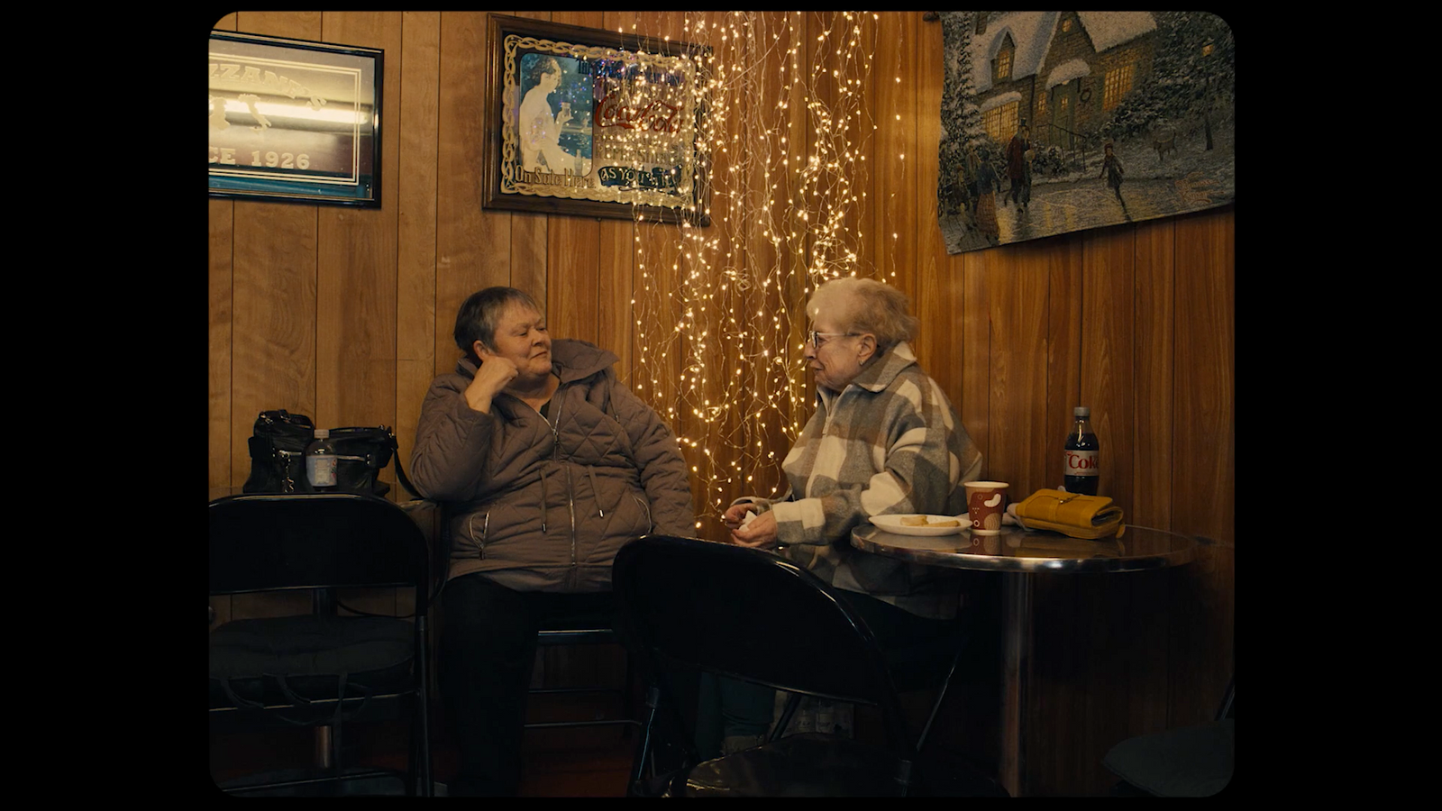 a couple of people sitting at a table