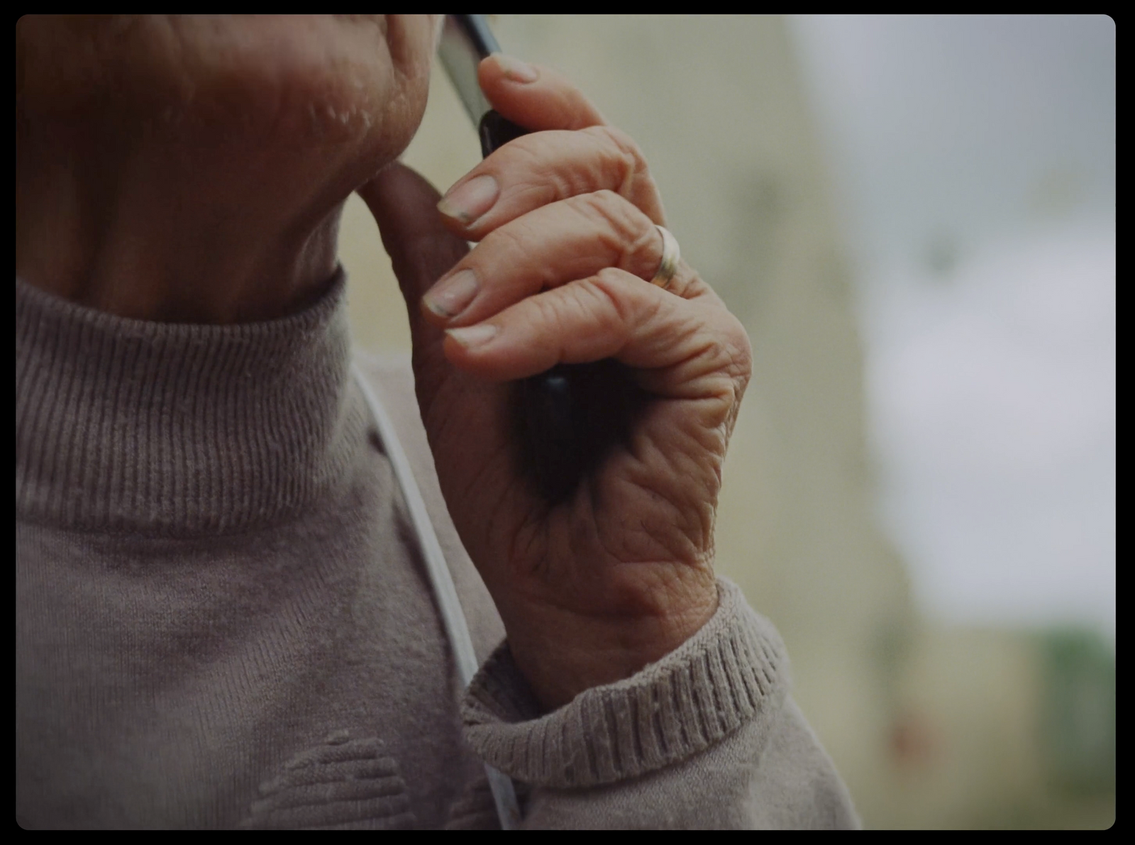 an older woman talking on a cell phone