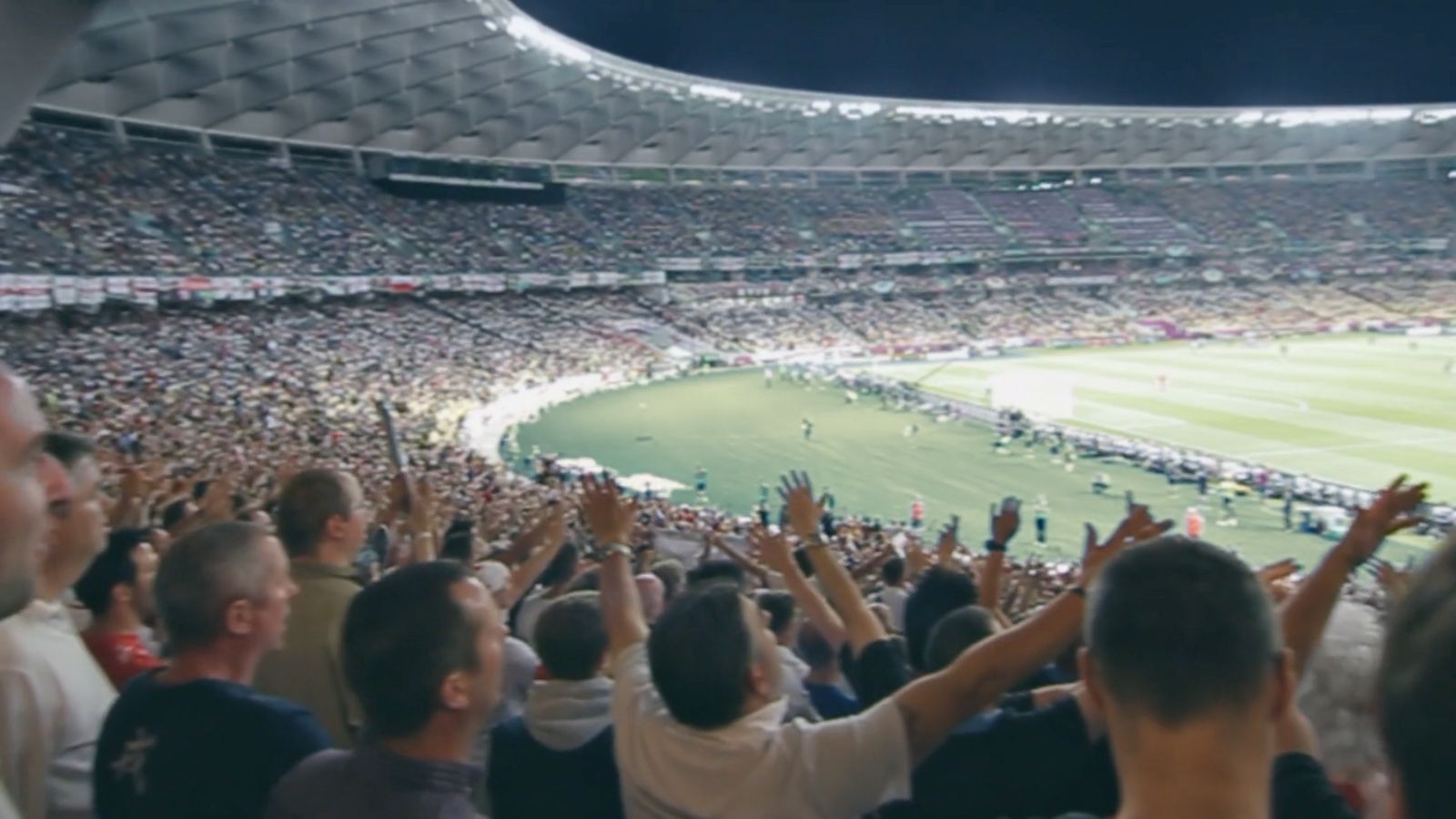 a large crowd of people at a soccer game