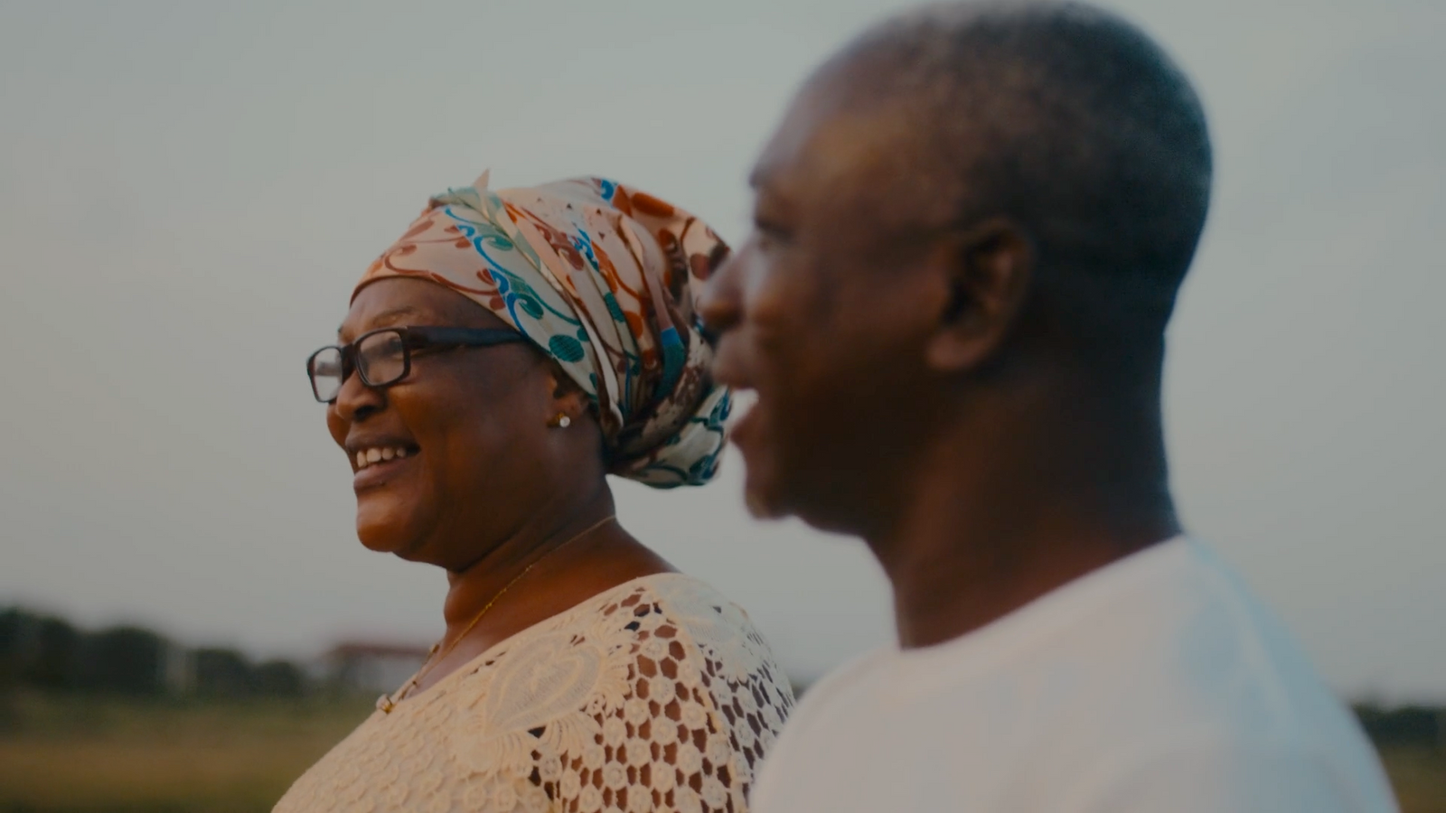 a man and a woman standing next to each other