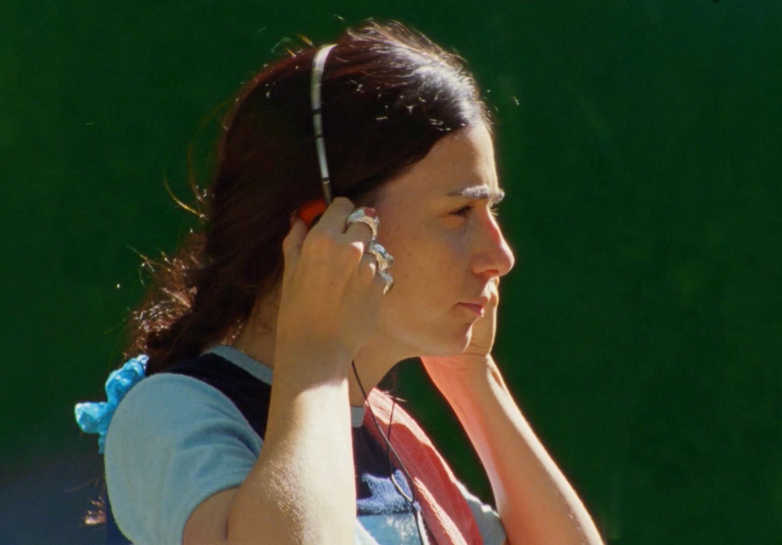 a woman with a cell phone to her ear