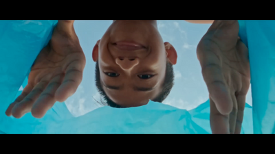 a man is upside down in the water