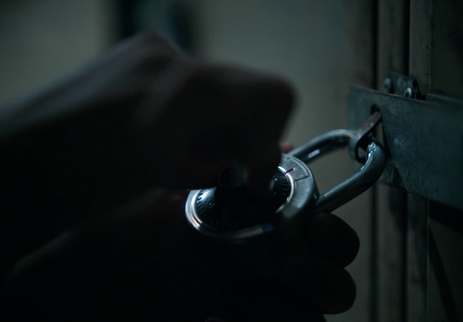 a person is holding a key to a door