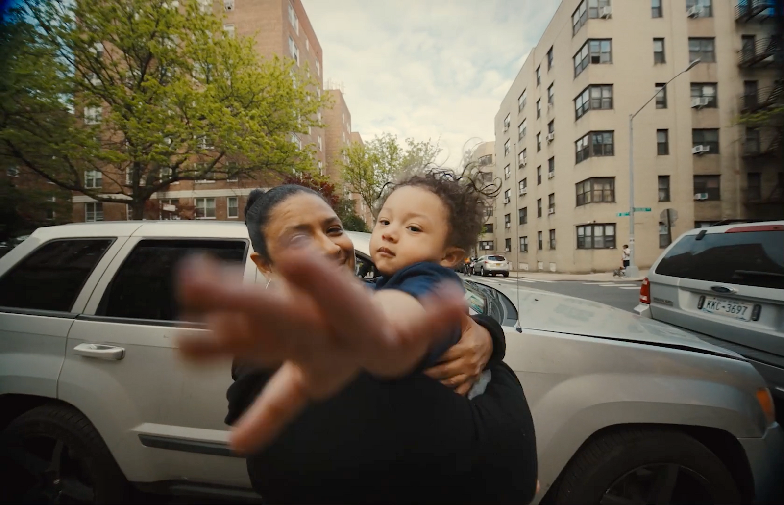 a woman holding a baby in her arms