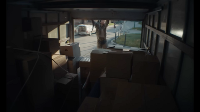 a room filled with boxes and a tree