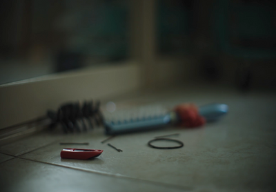 a couple of toothbrushes sitting on top of a counter