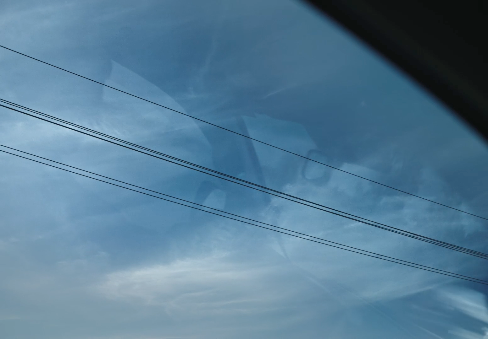 a view of the sky through a car window