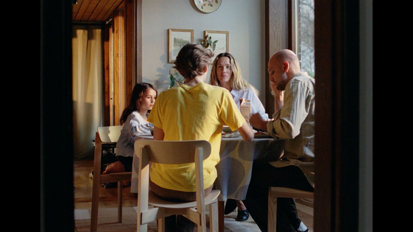 a group of people sitting around a table