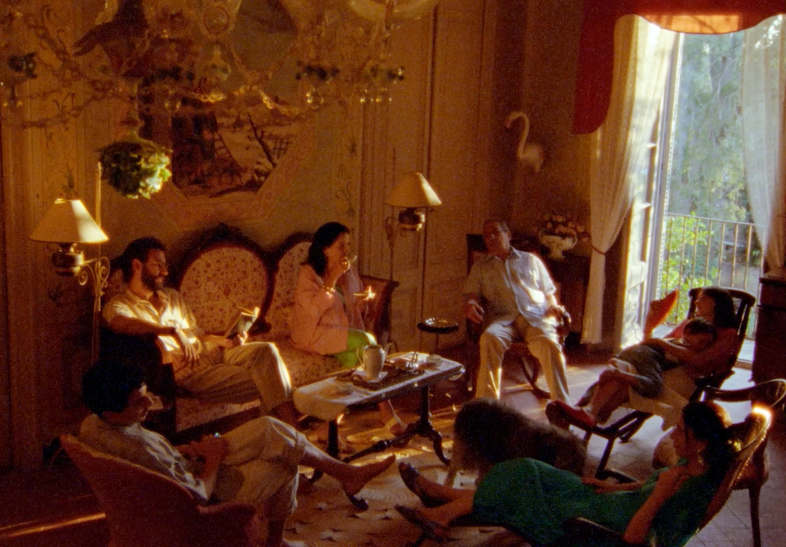 a group of people sitting around a living room