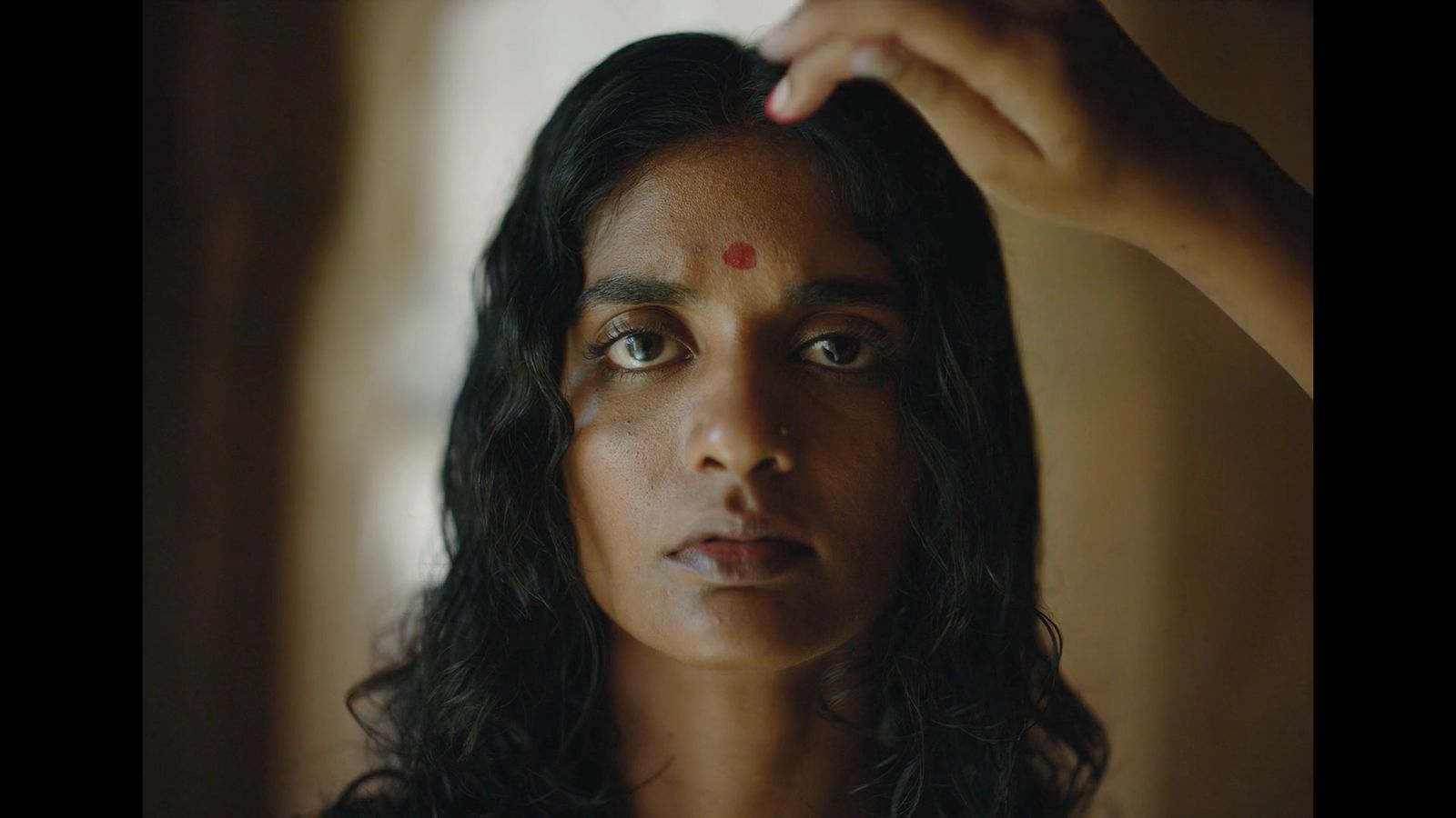 a close up of a person with long hair