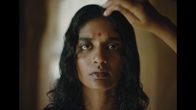 a close up of a person with long hair