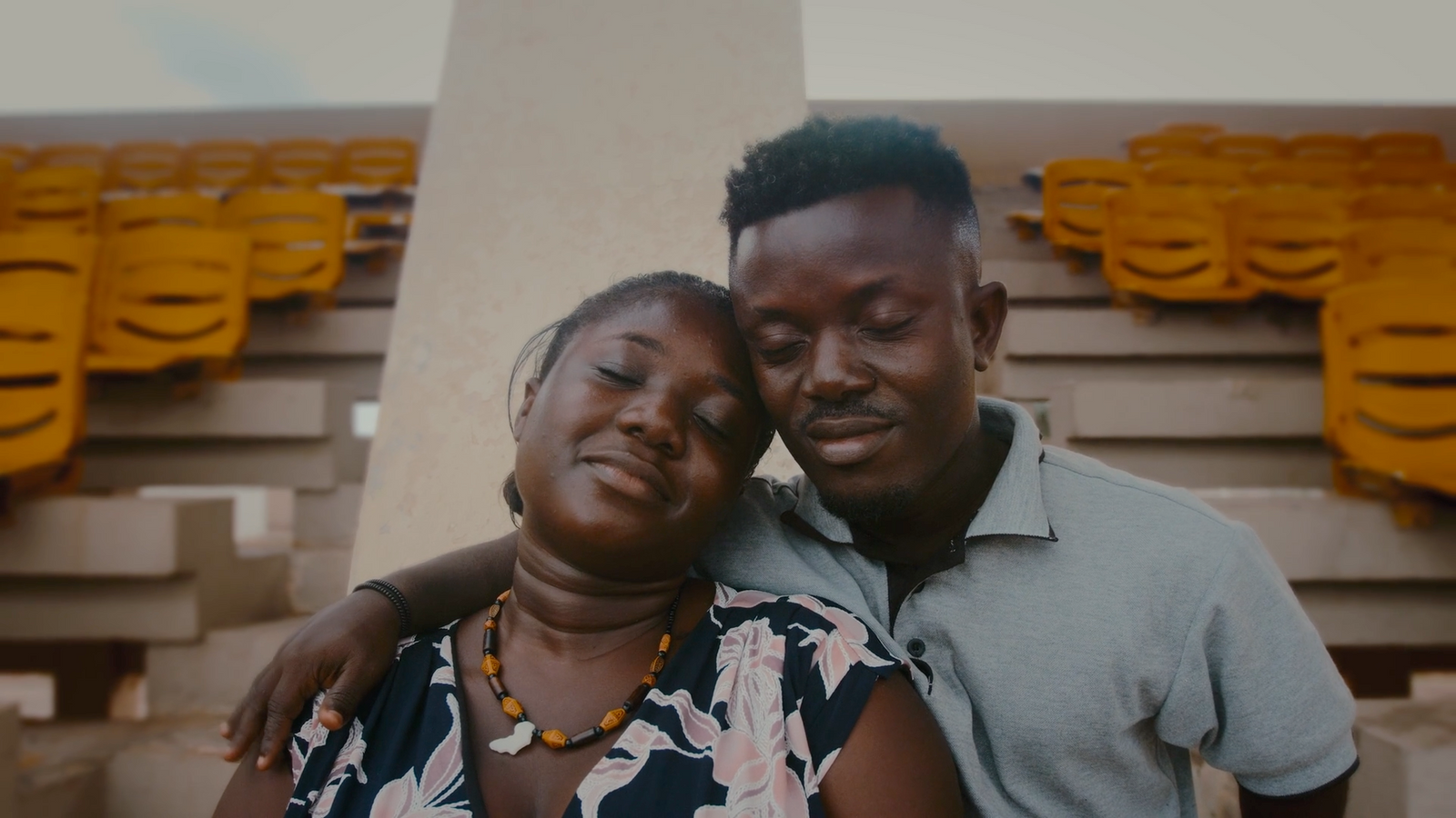 a man and a woman standing next to each other