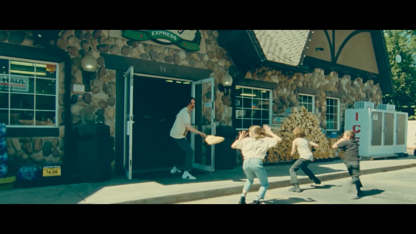 a group of young men playing a game of frisbee