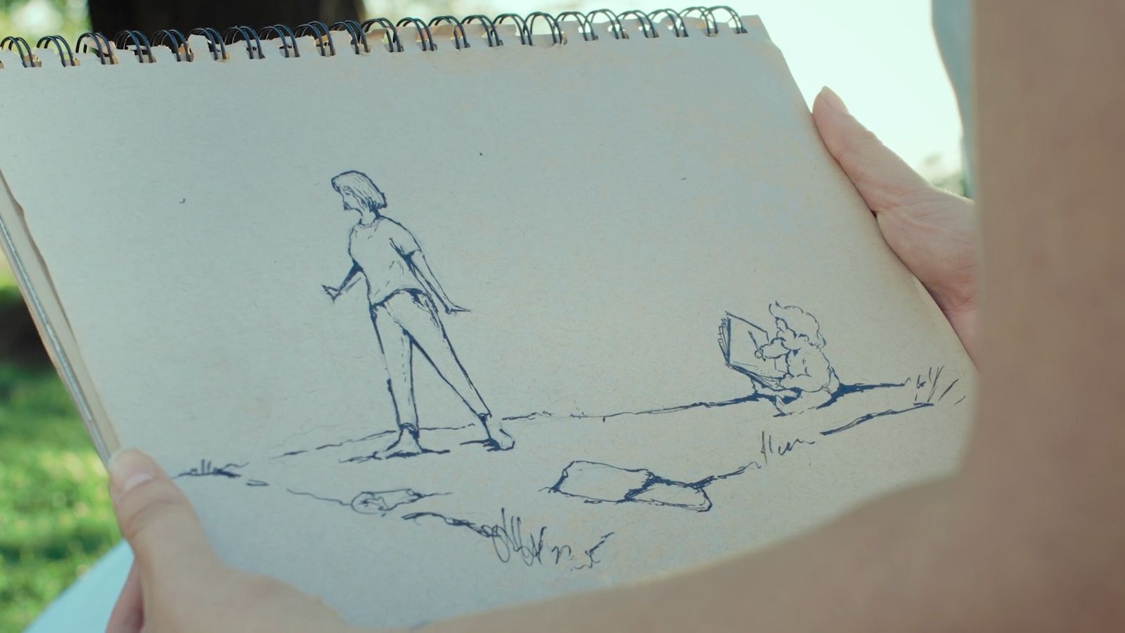 a drawing of a person standing on a hill