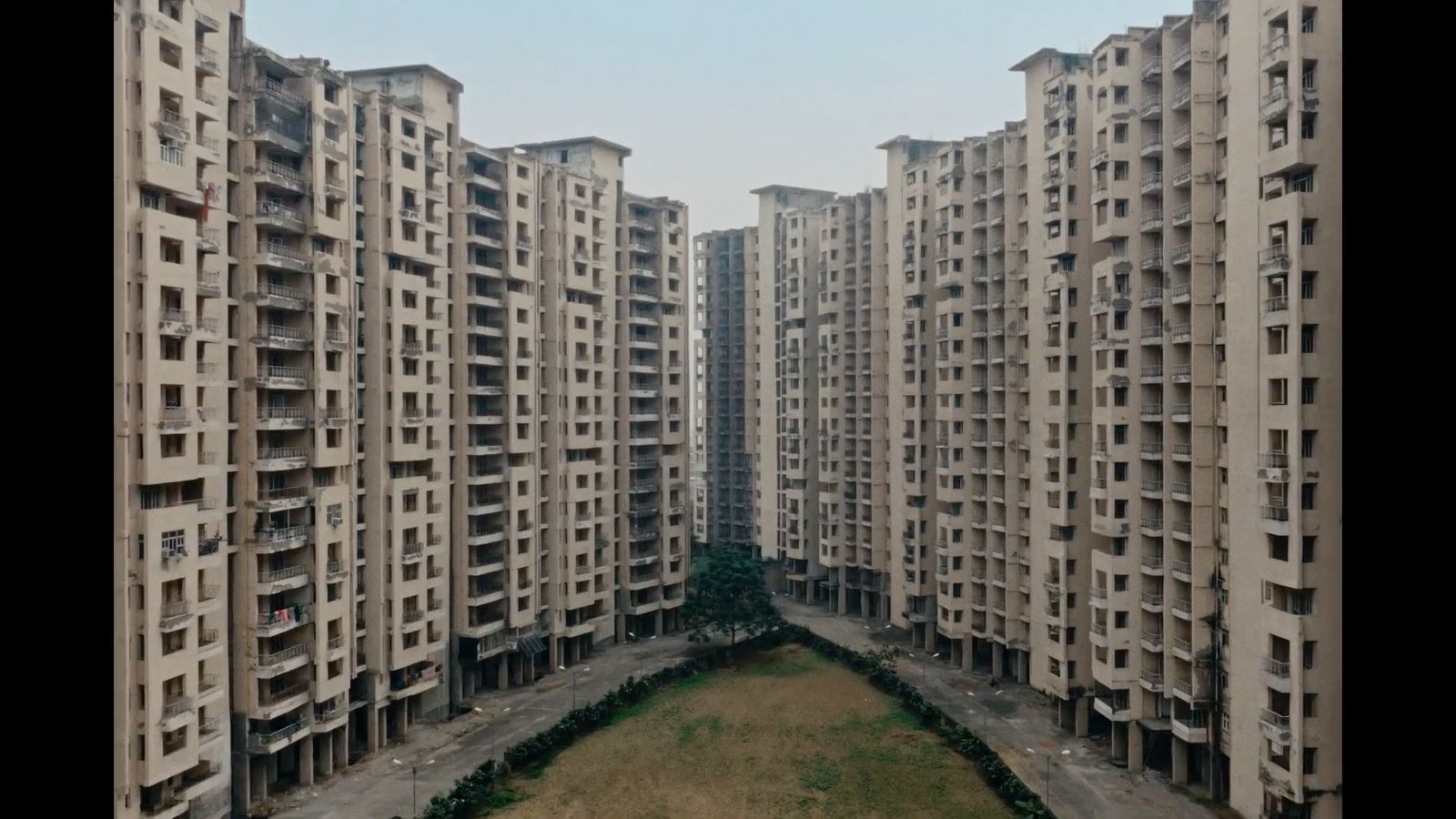 an aerial view of a group of tall buildings