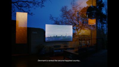 a large projection screen in a dark room