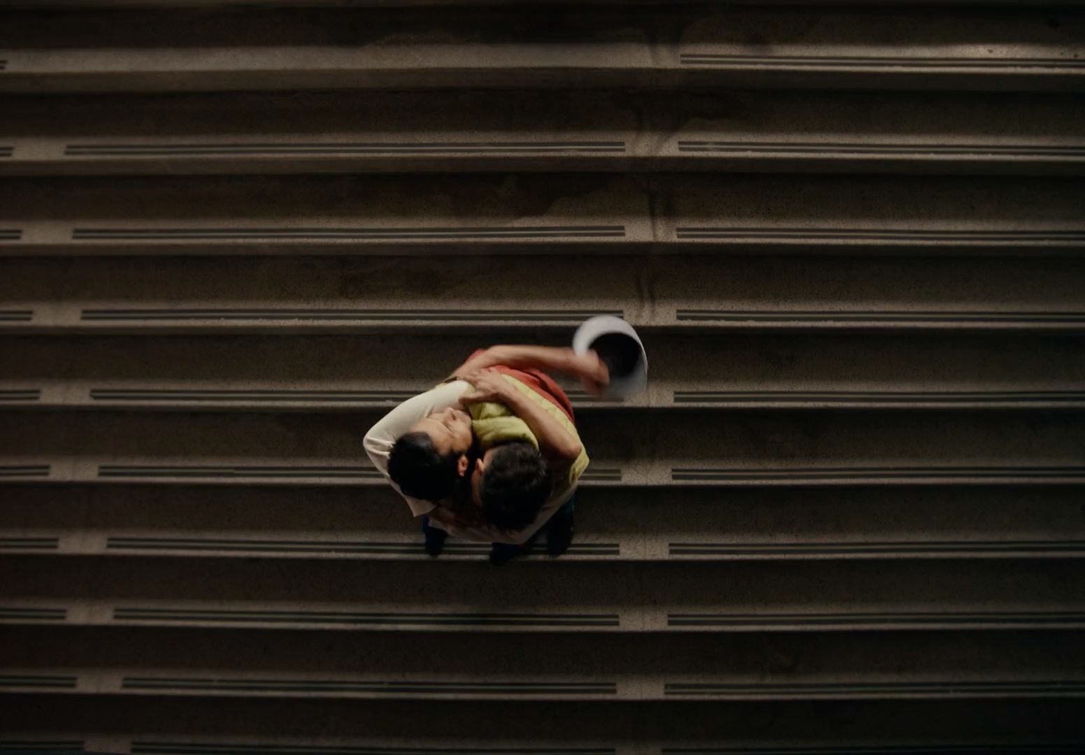 a man doing a handstand on a skateboard